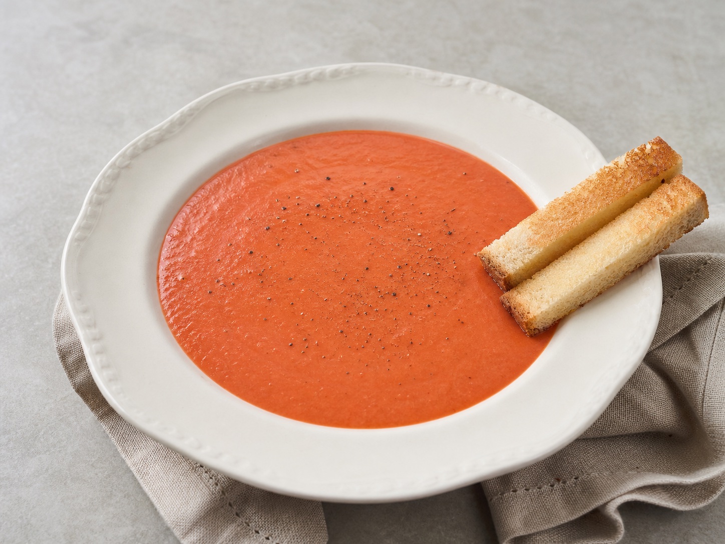 Fannie Farmer’s Cream of Tomato Soup, an original illustrative image based on the cited recipe